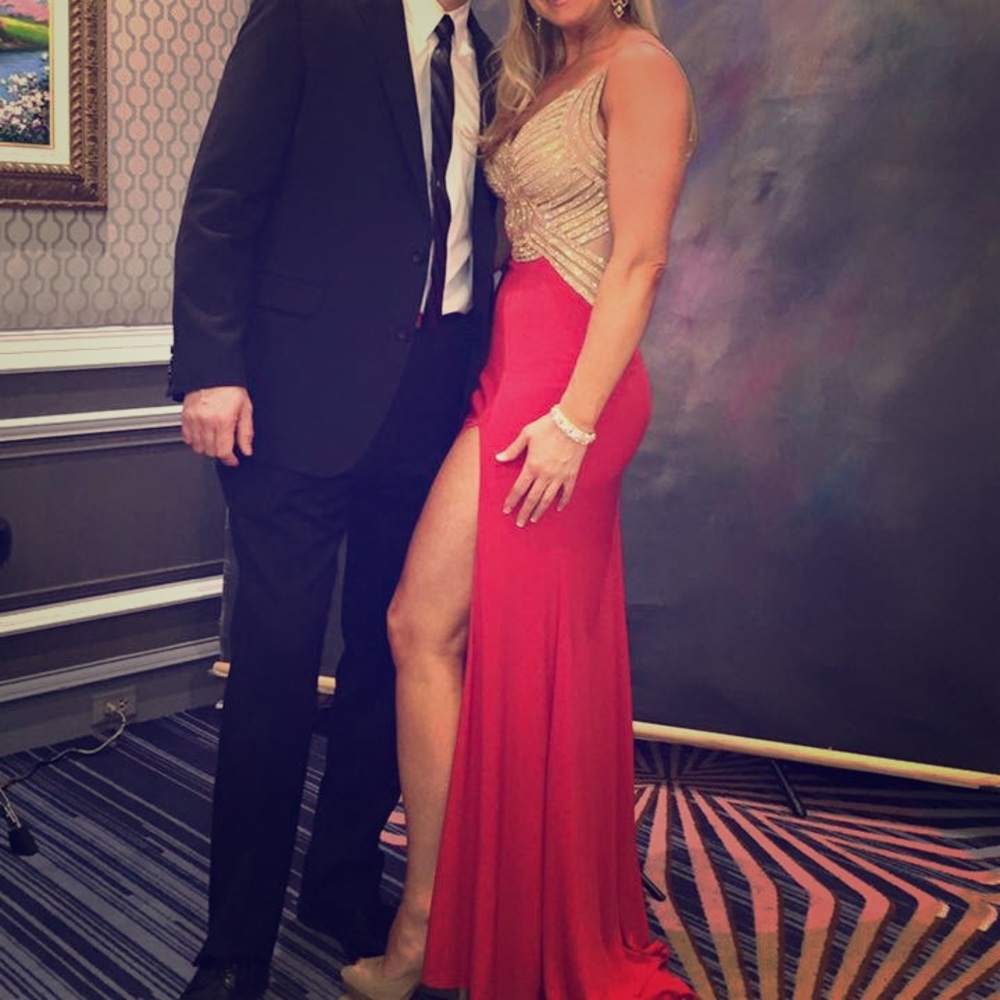 Long, red, high slit formal gown